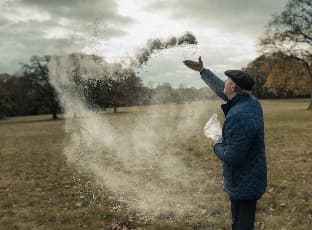 What Specific Eco-friendly Materials are Recommended for Scattering Ashes?